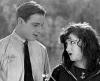 Rudolph_Valentino_smiles_at_Gloria_Swanson.